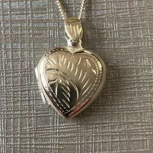 Silver chain with heart locket